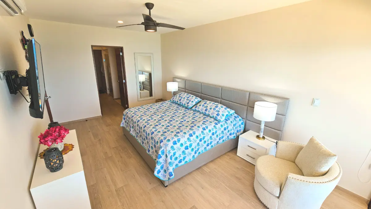 Unique game room style third bedroom with queen and full beds